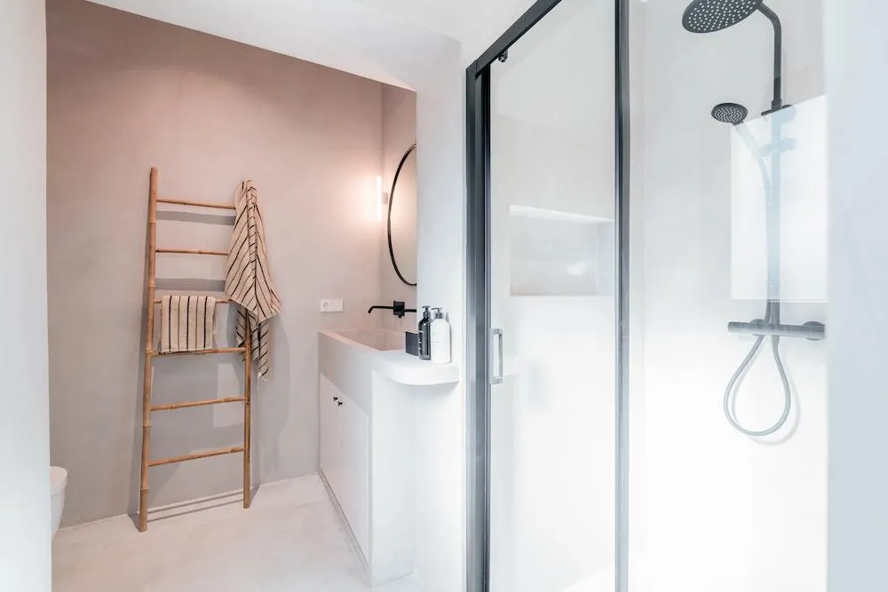 can microcement be applied over existing tile without removing it